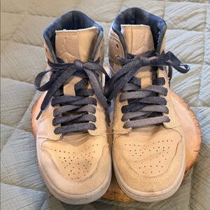 Air Jordan 1 Mid Sanddrift is a colorway of Michael Jordans first signature shoe